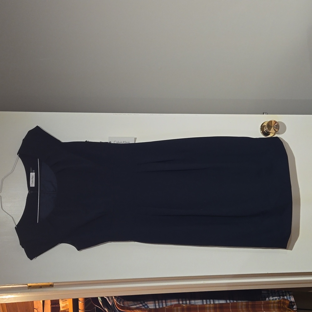 Womens size 4 Navy colored dress.
